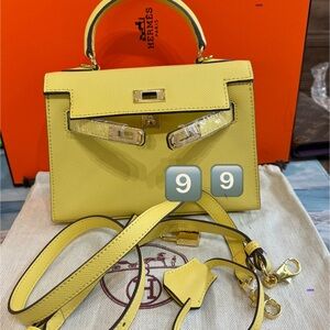 Kelly 22 style mini top handled bag in yellow Epsom leather with dust bag new